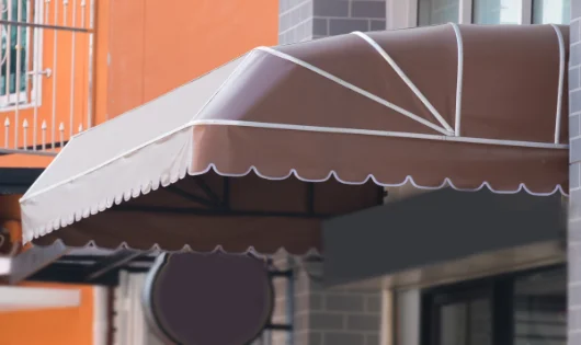 A dome awning on the side of a building