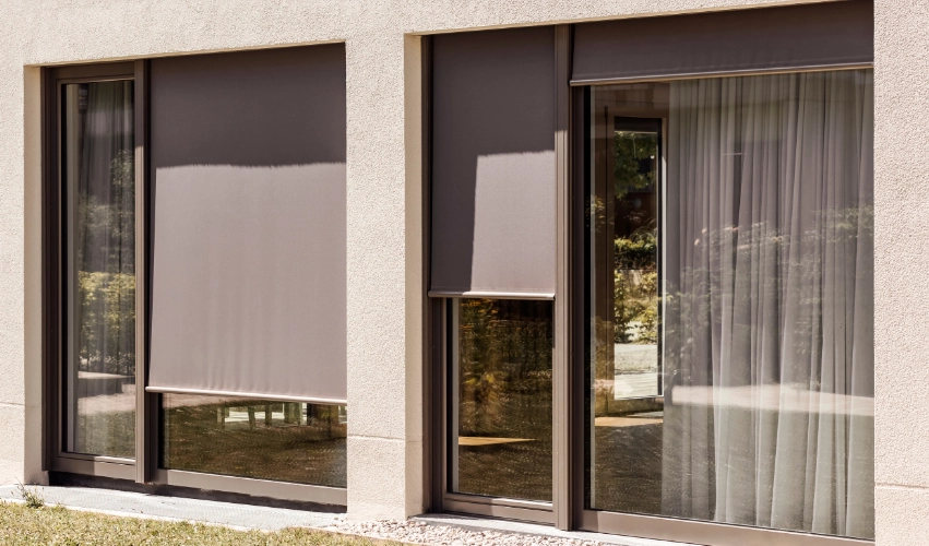 Glass doors with outdoor roller shades