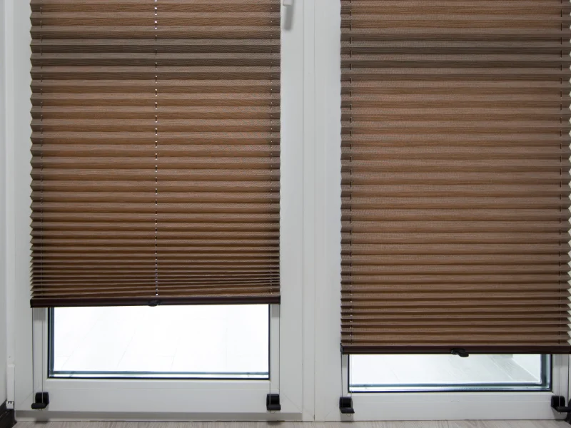 Brown shades with small pleats.