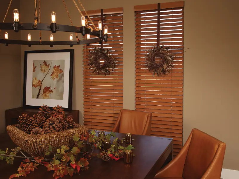 Wooden blinds in a dining room.