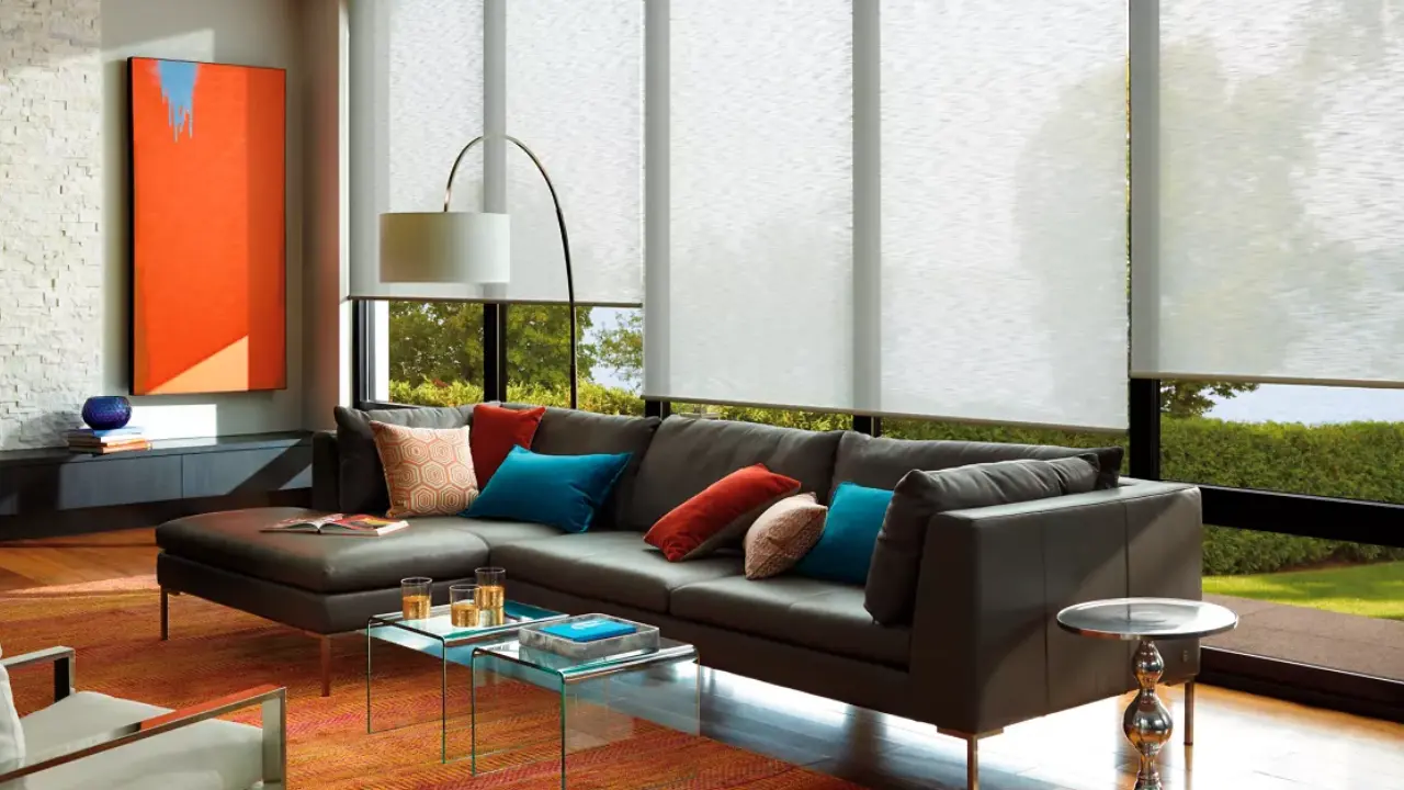 A living room with woven wood shades