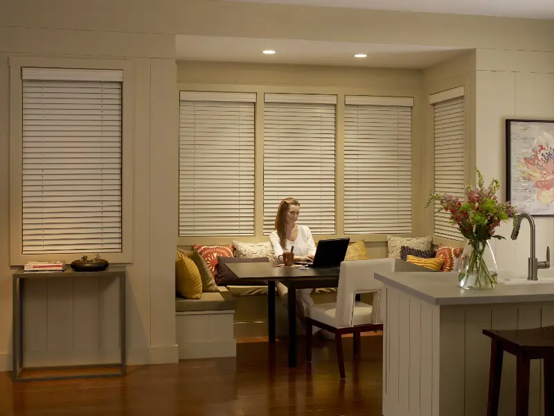 Beige Venetian blinds in a living area