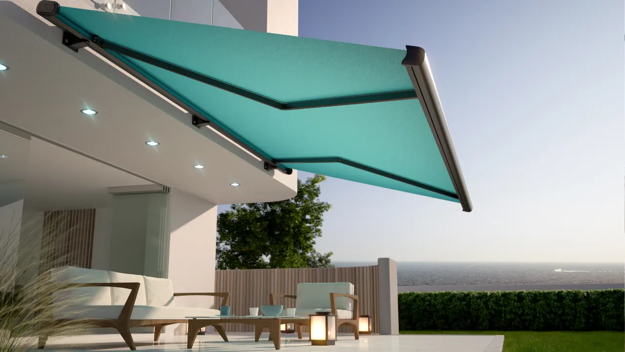 An outdoor patio with a teal retractable awning